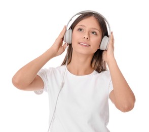 Photo of Teenage girl listening to music with headphones on white background