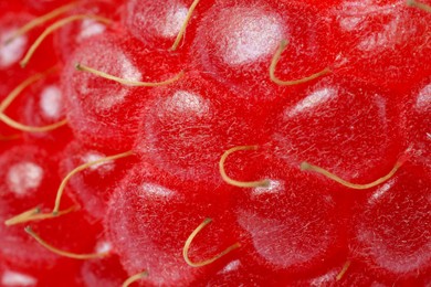 Photo of Texture of ripe raspberry as background, macro view. Fresh berry