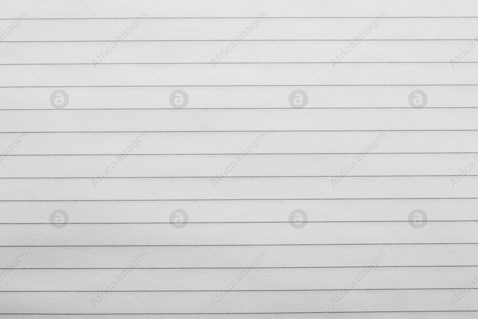 Photo of Lined notebook sheet as background, top view