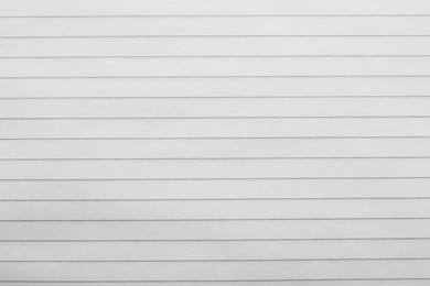 Photo of Lined notebook sheet as background, top view