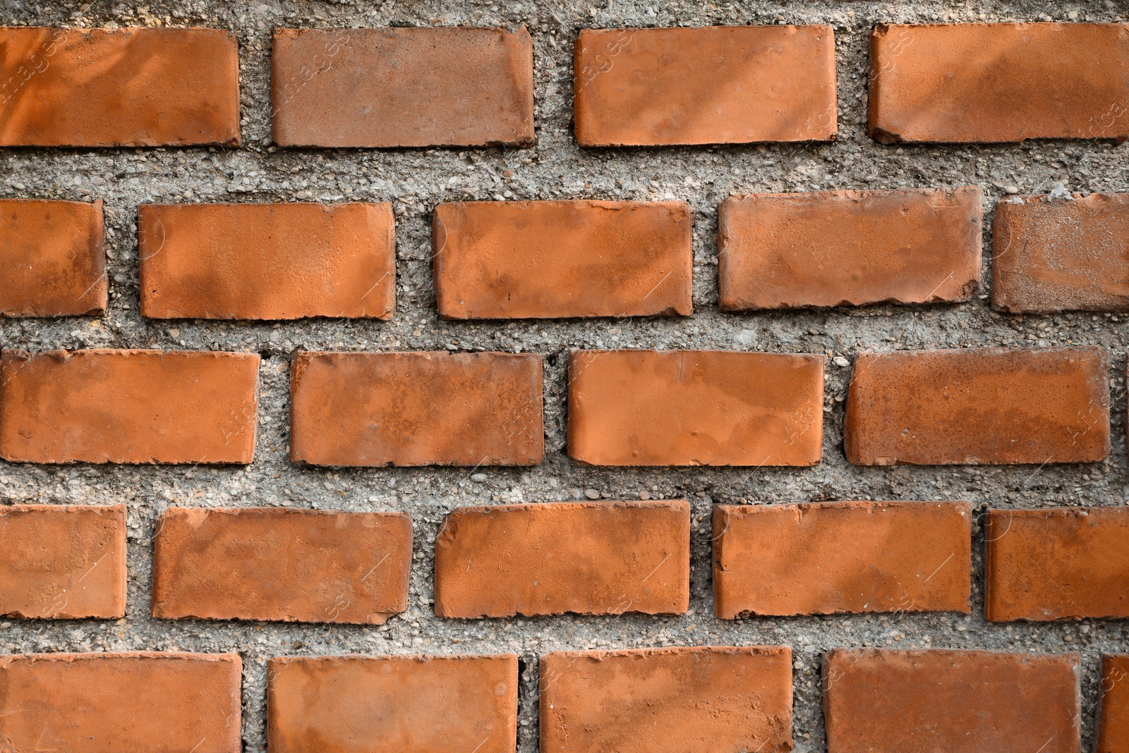 Photo of Texture of red brick wall as background, closeup view