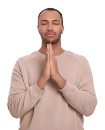 Photo of African American man with clasped hands praying to God on white background