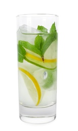 Glass of refreshing drink with citrus slices and mint on white background