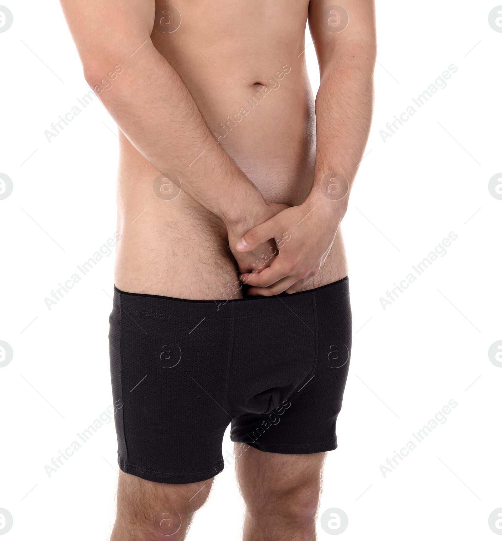 Photo of Young man with urological problems on white background