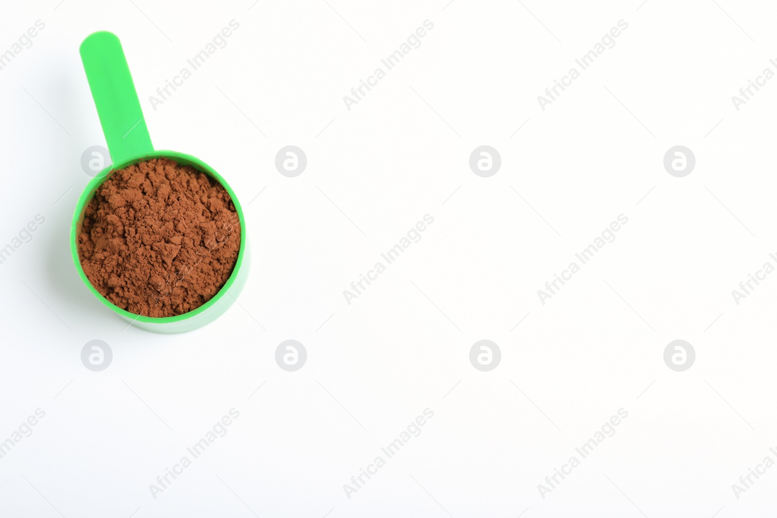 Photo of Scoop of protein powder on white background, top view