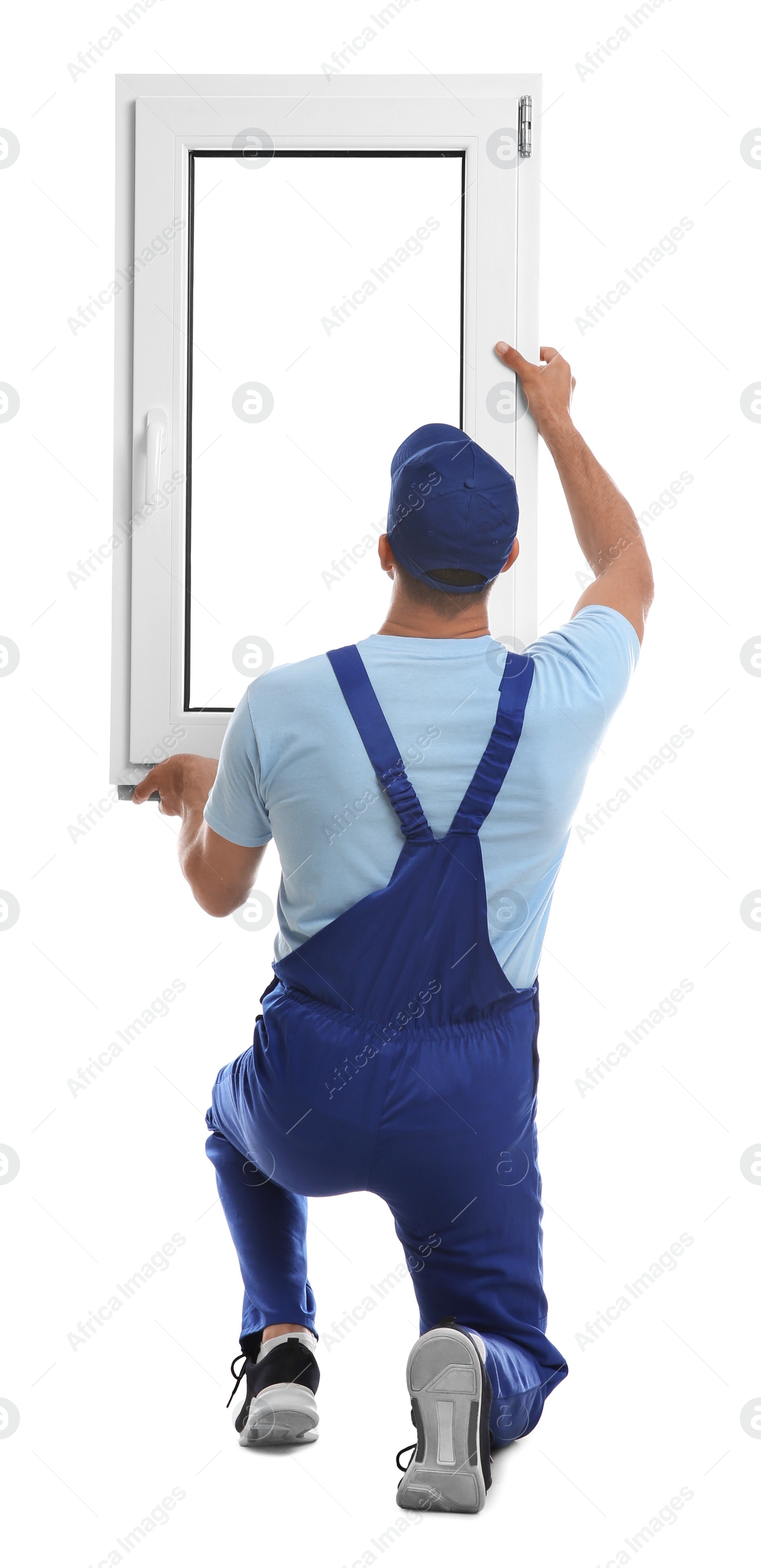 Photo of Worker with plastic window on white background, back view. Installation service