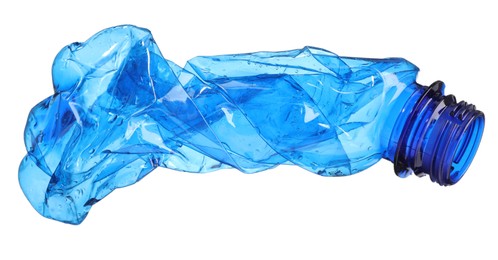 Crumpled disposable plastic bottle isolated on white