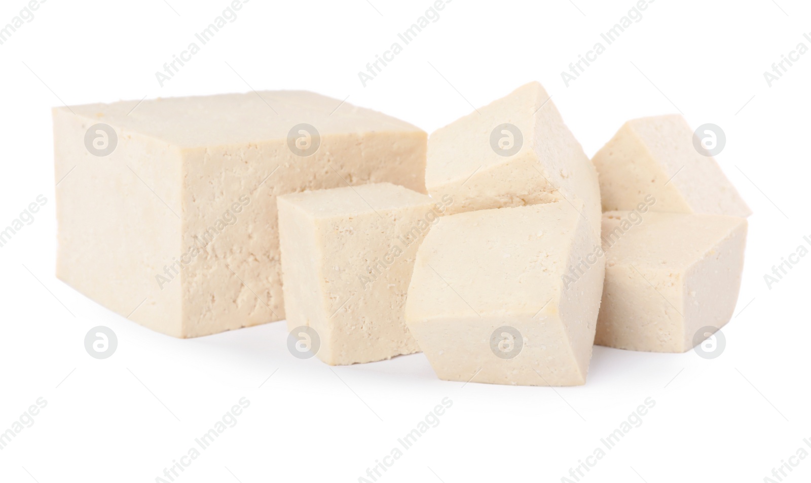 Photo of Different raw tofu pieces on white background