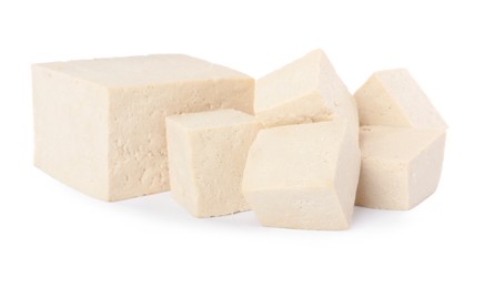 Photo of Different raw tofu pieces on white background