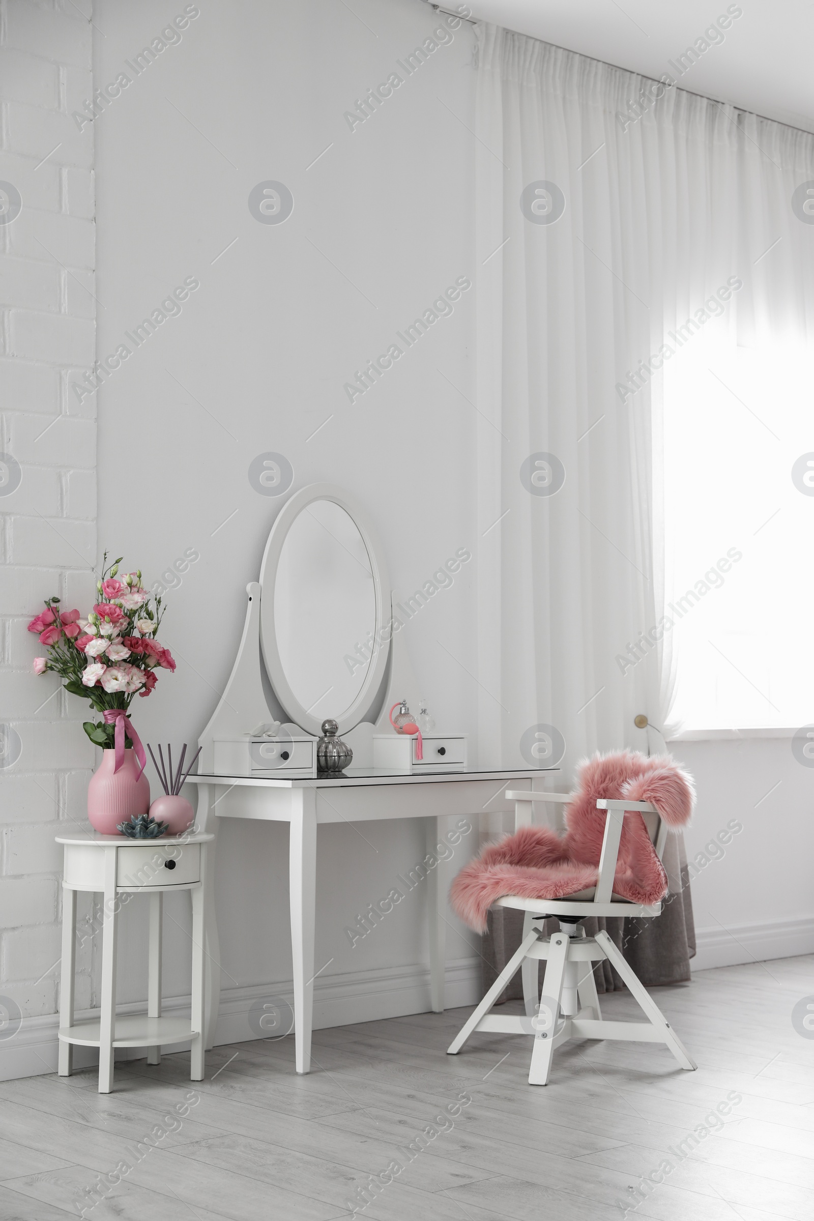Photo of Stylish room interior with white dressing table