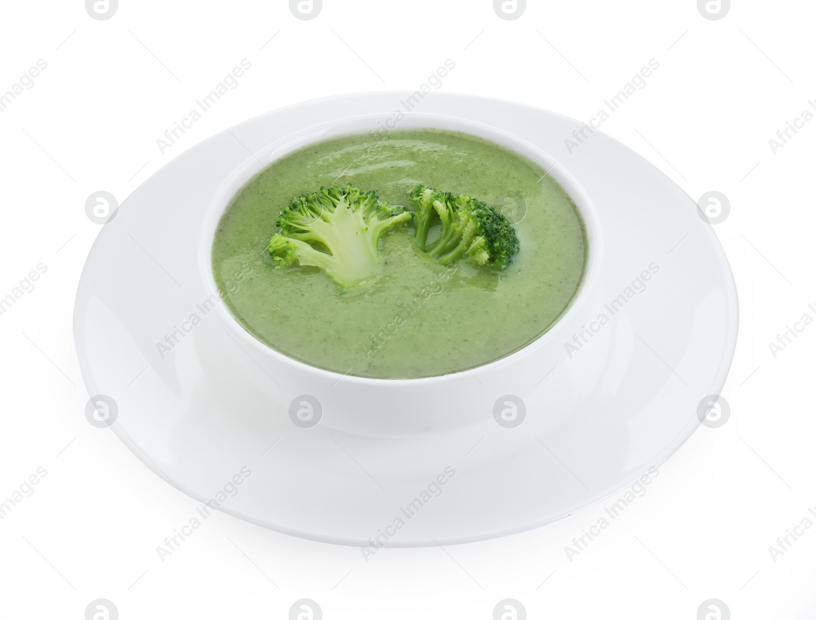 Photo of Delicious broccoli cream soup in bowl isolated on white