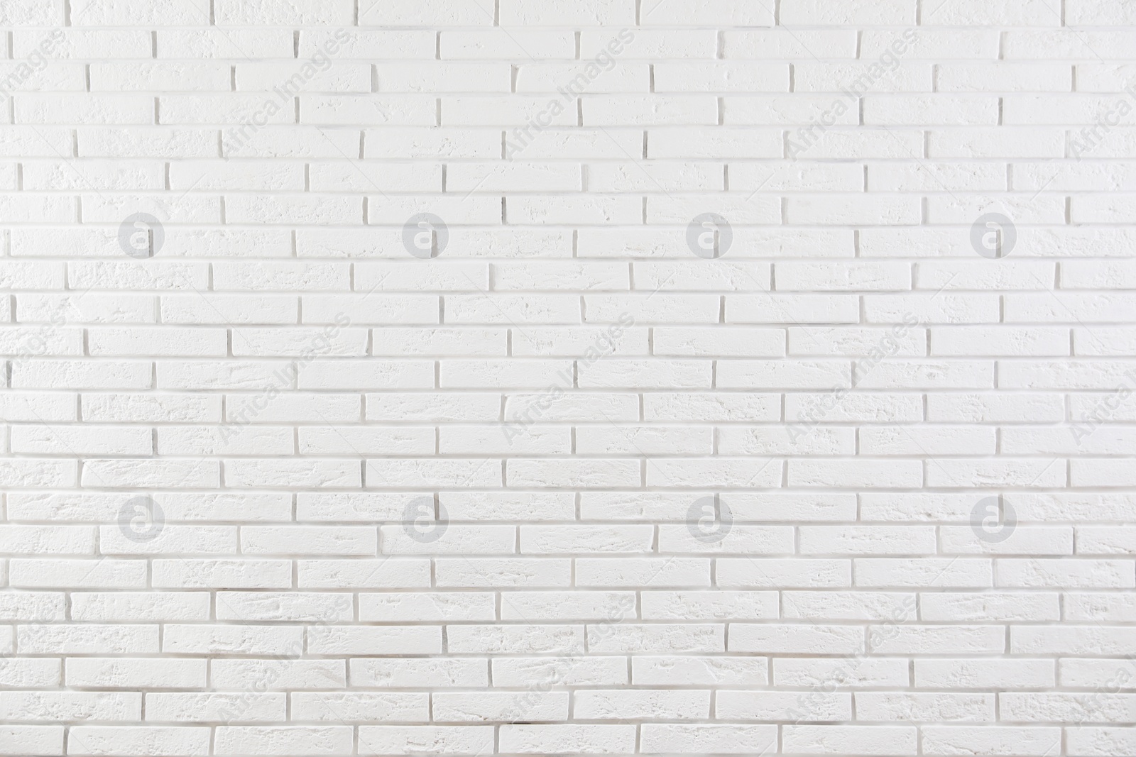 Photo of White brick wall as background. Simple design