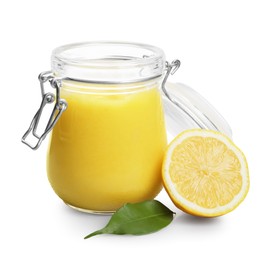 Photo of Delicious lemon curd in glass jar, fresh citrus fruit and green leaf isolated on white