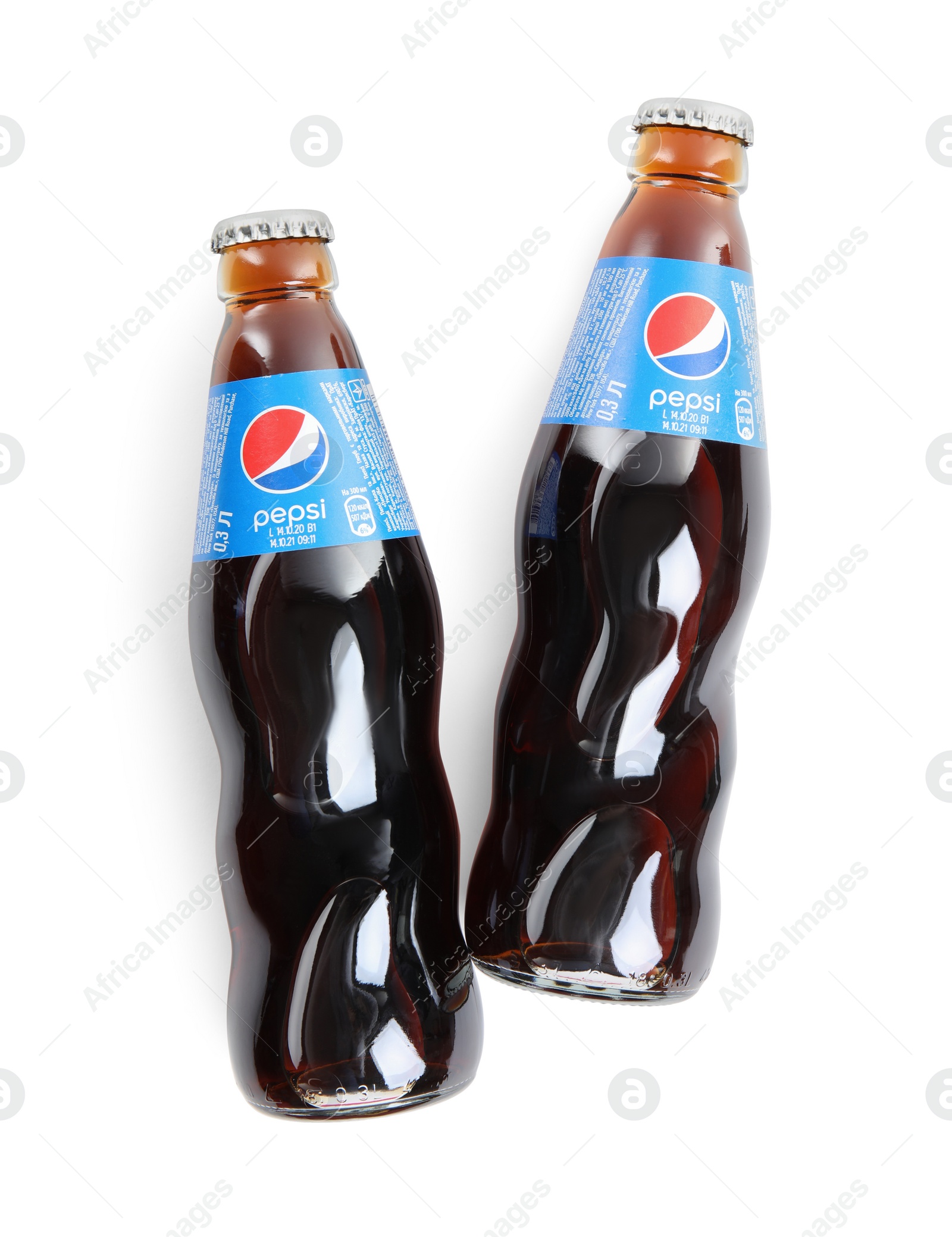 Photo of MYKOLAIV, UKRAINE - FEBRUARY 10, 2021: Bottles of Pepsi on white background, top view