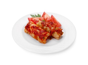 Photo of Plate of delicious stuffed cabbage rolls and tomatoes isolated on white
