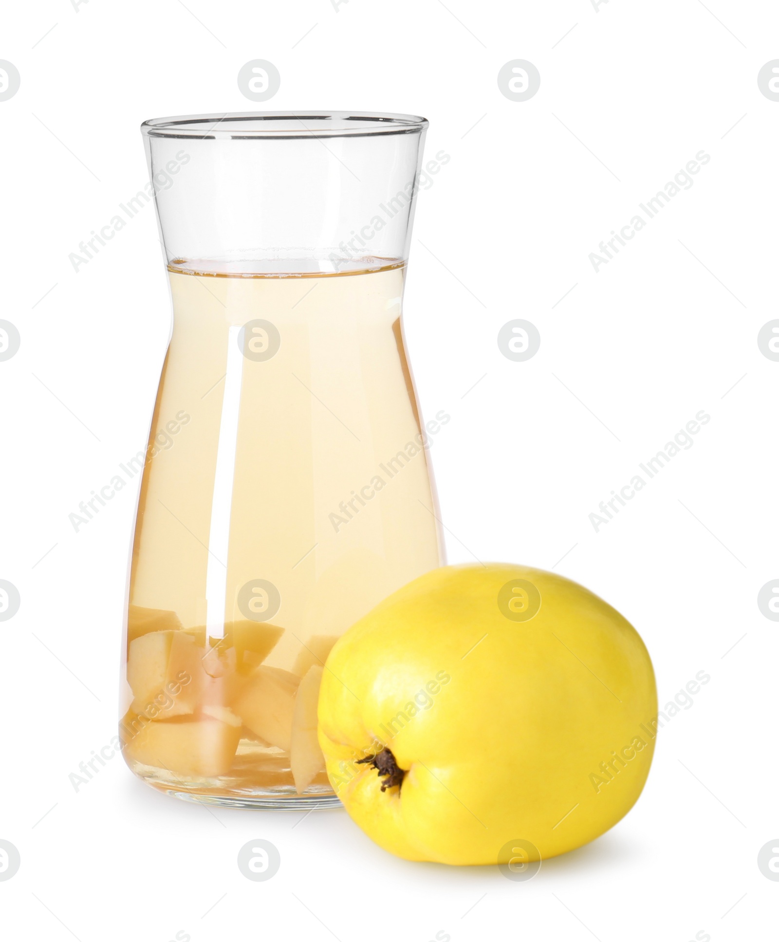 Photo of Tasty quince drink in glass carafe and fresh fruit isolated on white