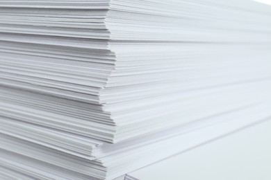 Photo of Stack of white paper sheets, closeup view