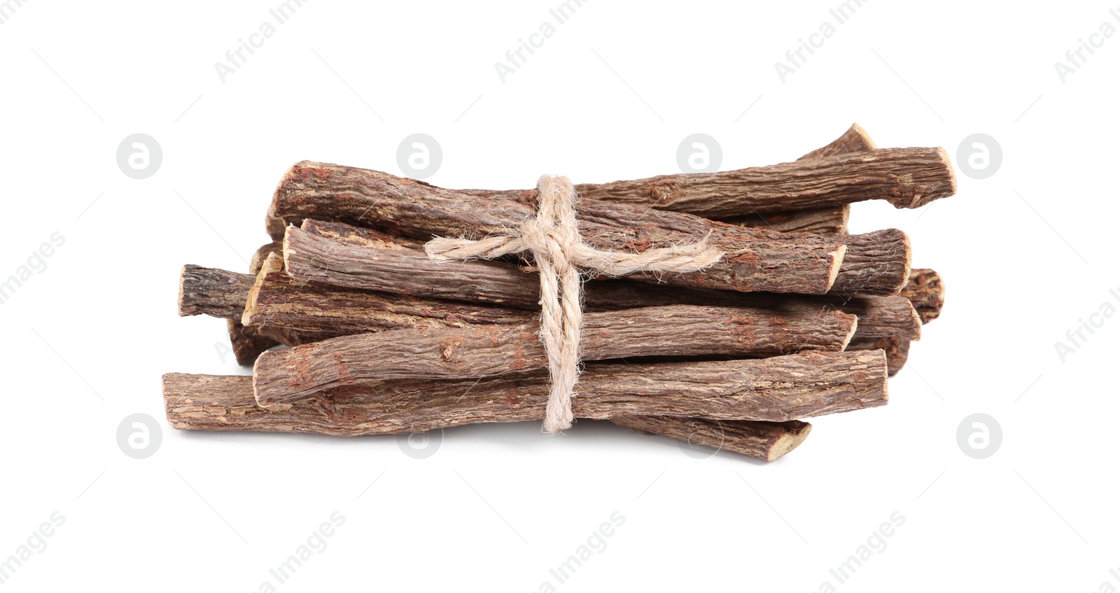 Photo of Dried sticks of liquorice root on white background