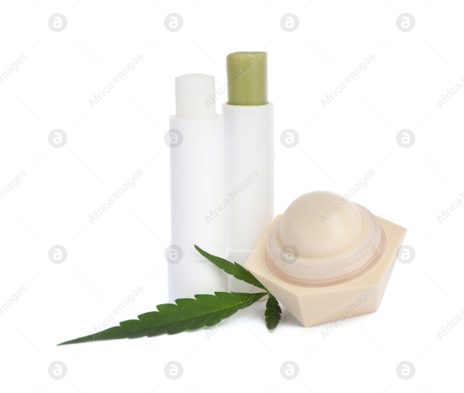 Photo of Different hemp cosmetics and green leaf on white background