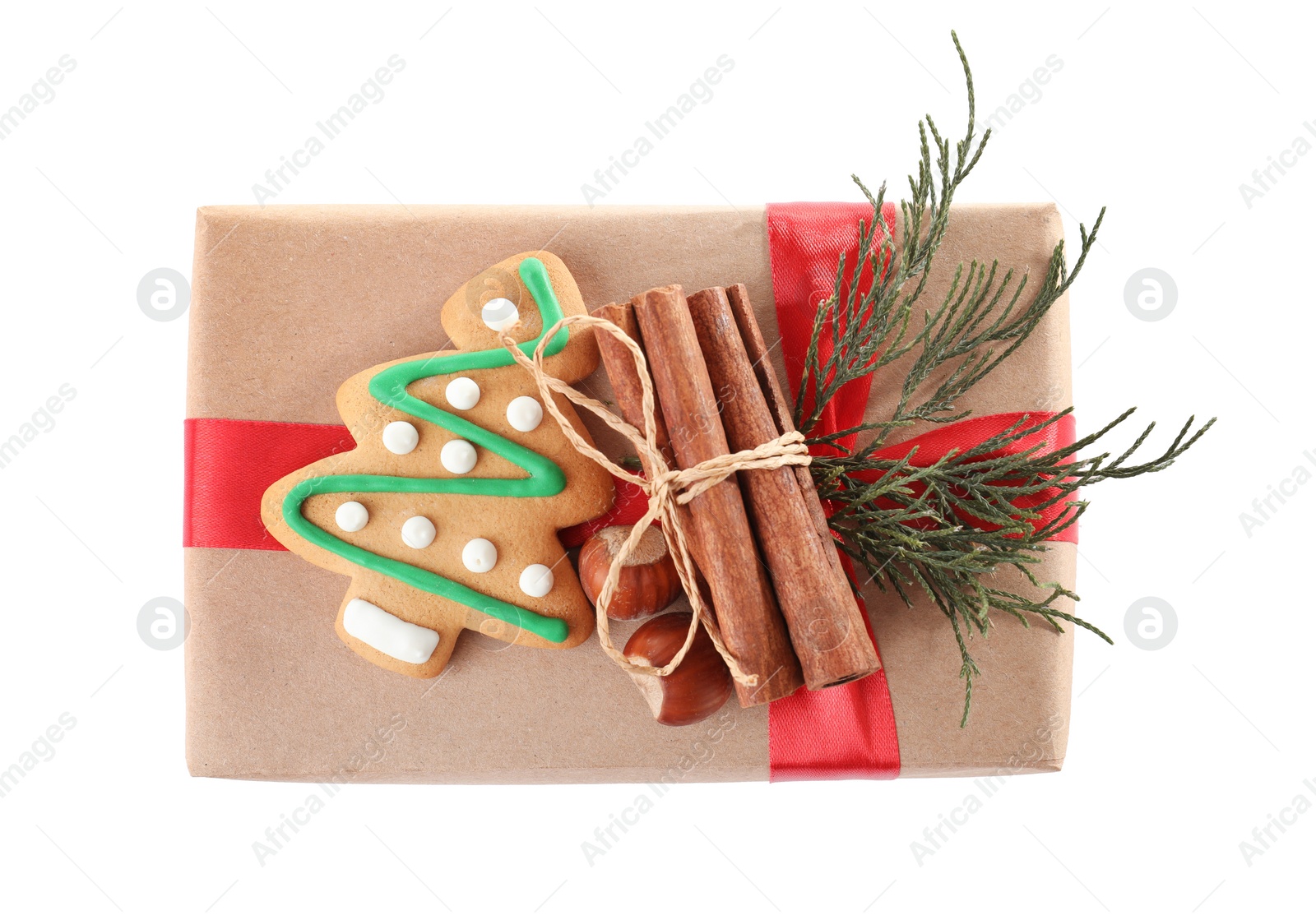 Photo of Christmas gift box with decoration on white background, top view