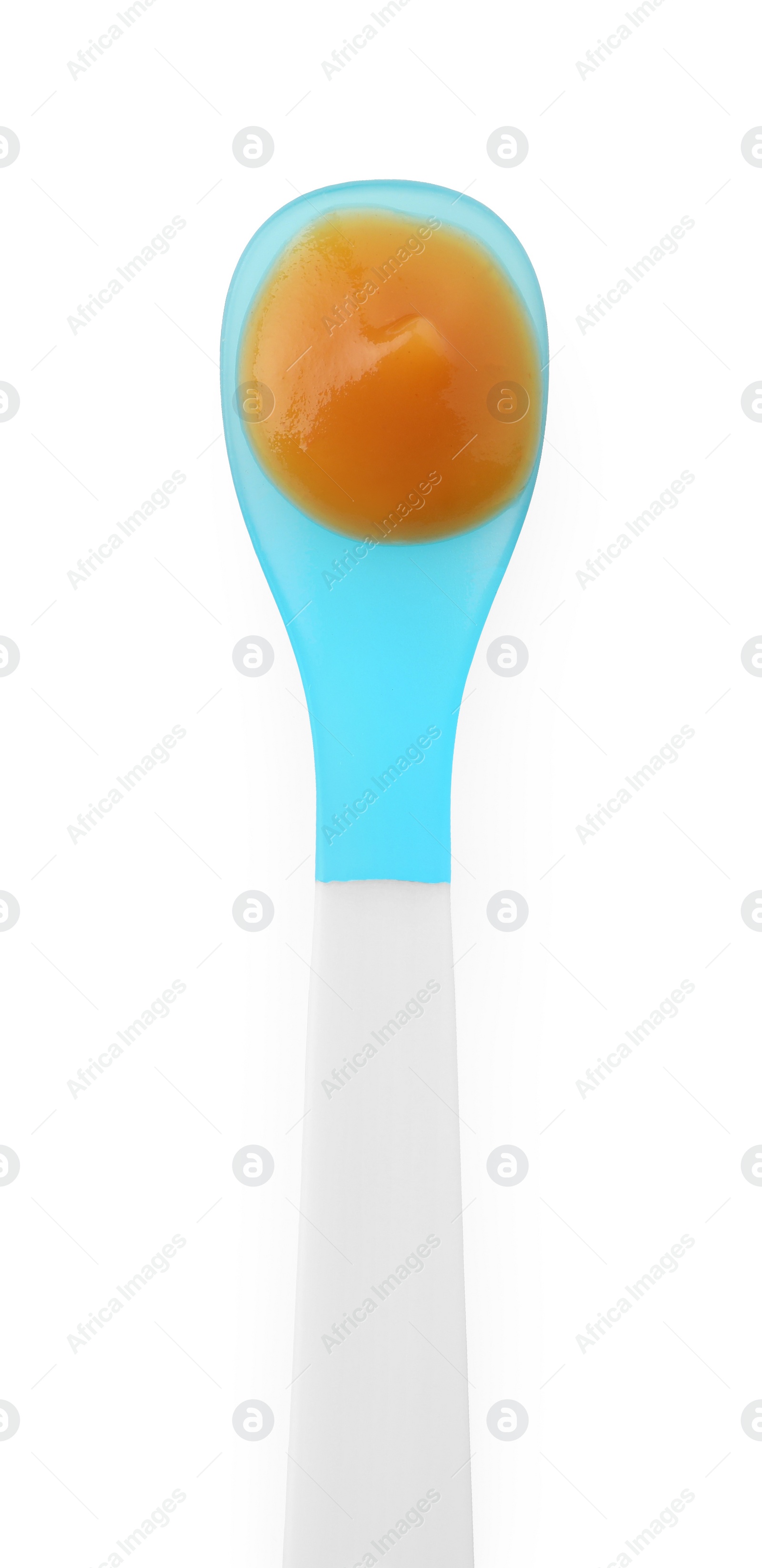 Photo of Healthy baby food in spoon isolated on white, top view