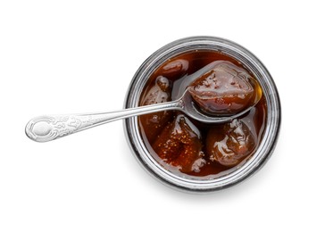 Jar of tasty sweet fig jam and spoon isolated on white, top view