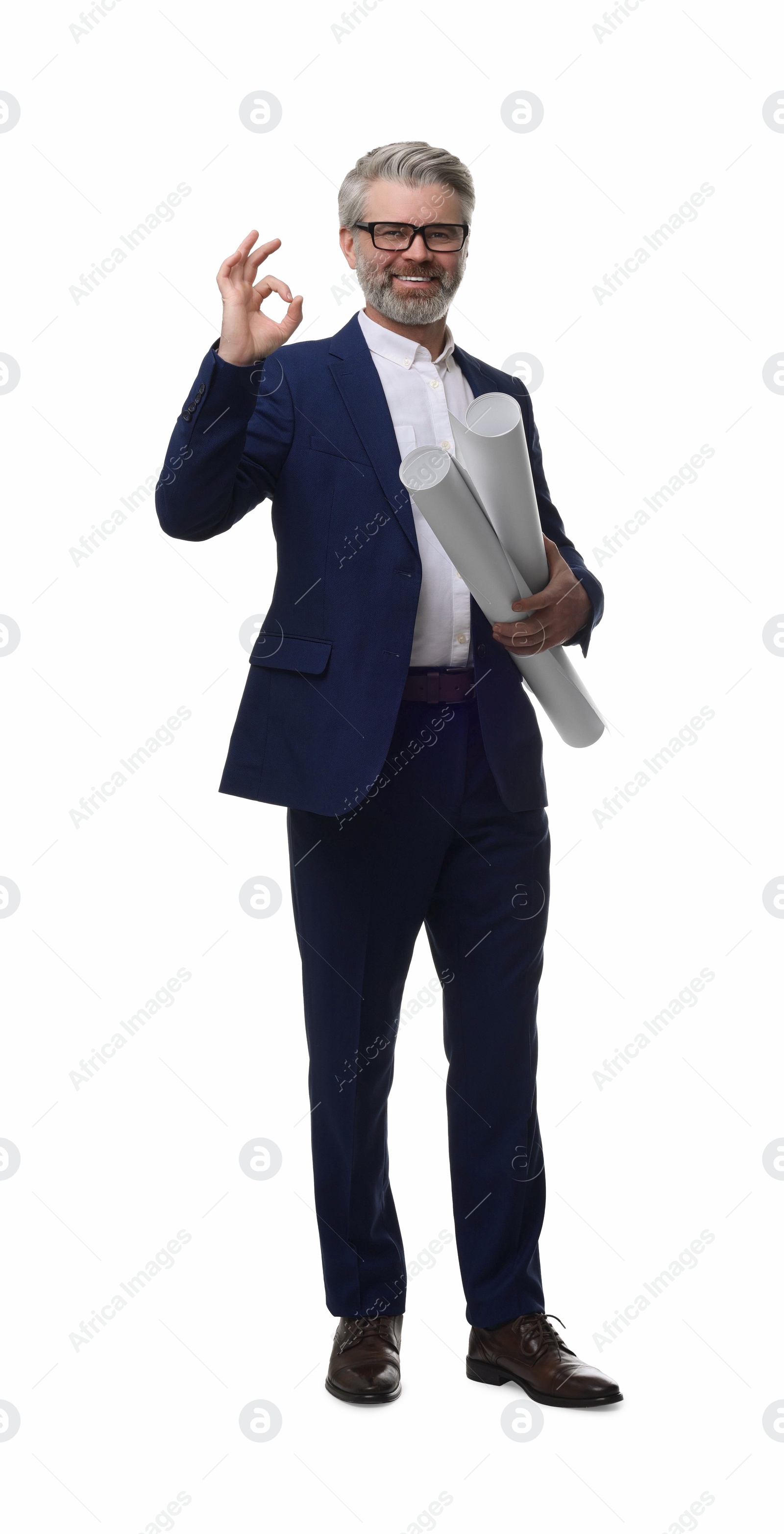 Photo of Architect in glasses holding drafts and showing ok gesture on white background