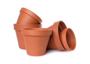 Empty clay flower pots isolated on white