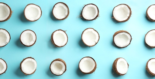 Photo of Coconut pattern on color background, flat lay