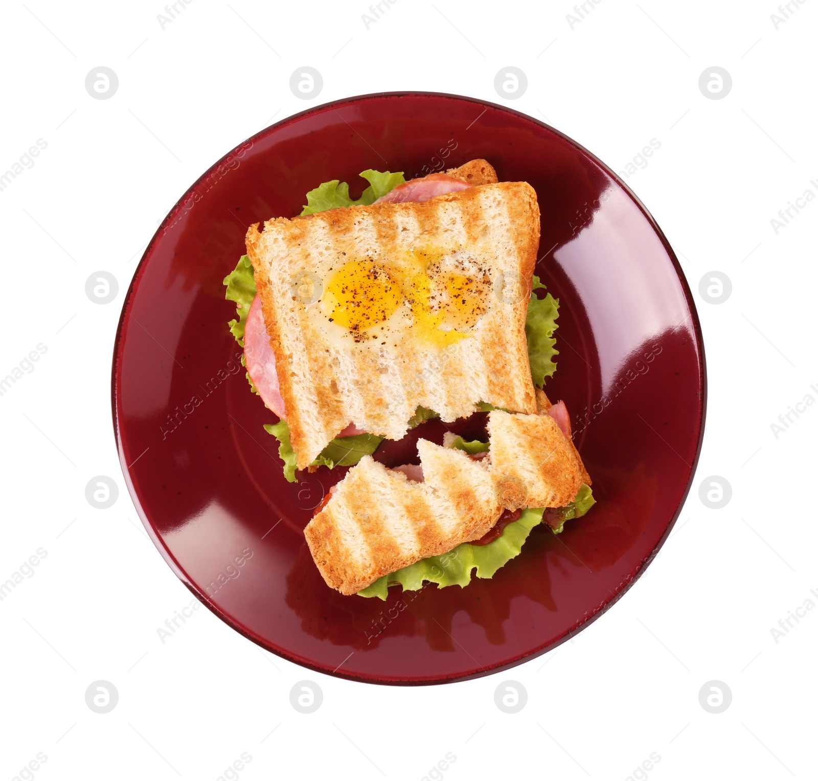 Photo of Cute monster sandwich with fried eggs isolated on white, top view. Halloween snack