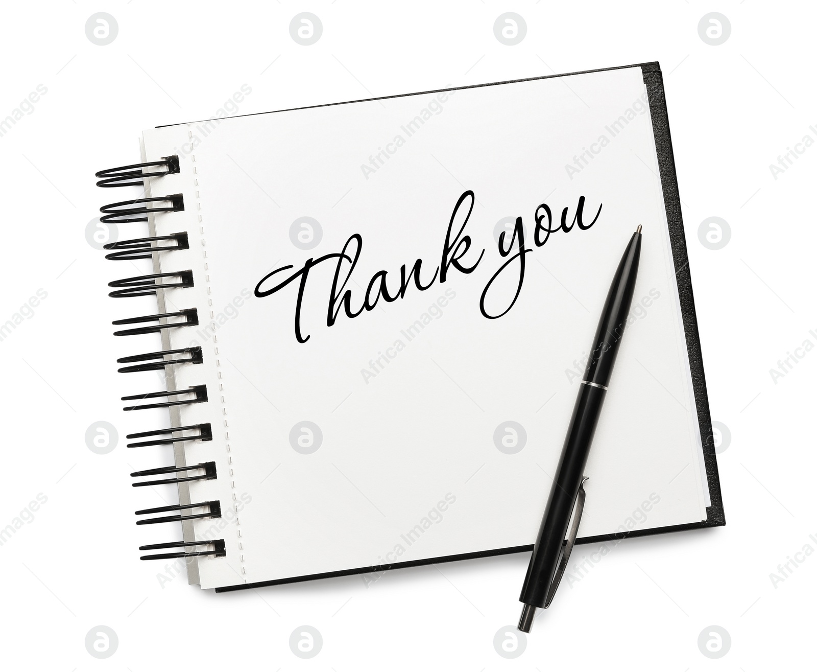 Image of Phrase Thank You written in notebook and pen on white background, top view