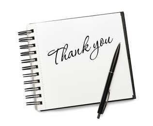 Phrase Thank You written in notebook and pen on white background, top view