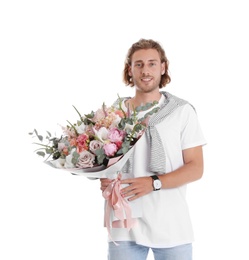 Photo of Young handsome man with beautiful flower bouquet on white background