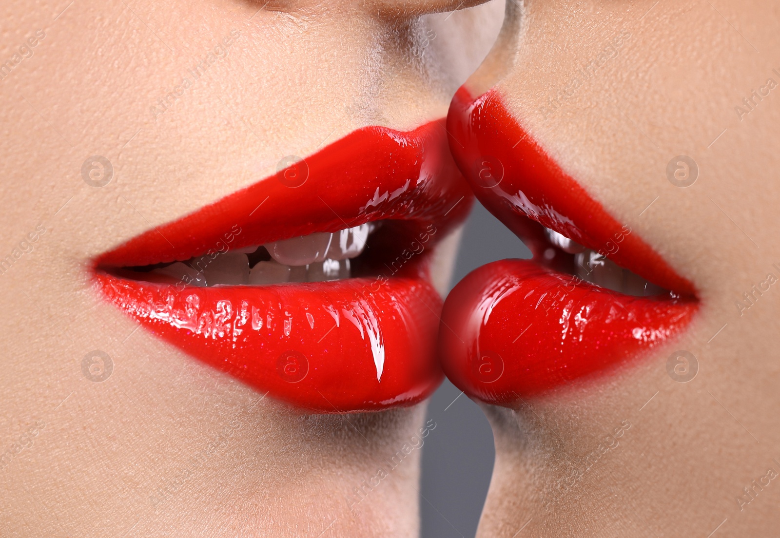 Image of Closeup view of girls kissing each other. Lesbian couple