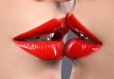 Image of Closeup view of girls kissing each other. Lesbian couple