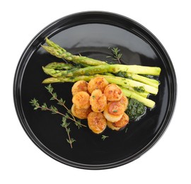 Photo of Delicious fried scallops with asparagus and thyme isolated on white, top view