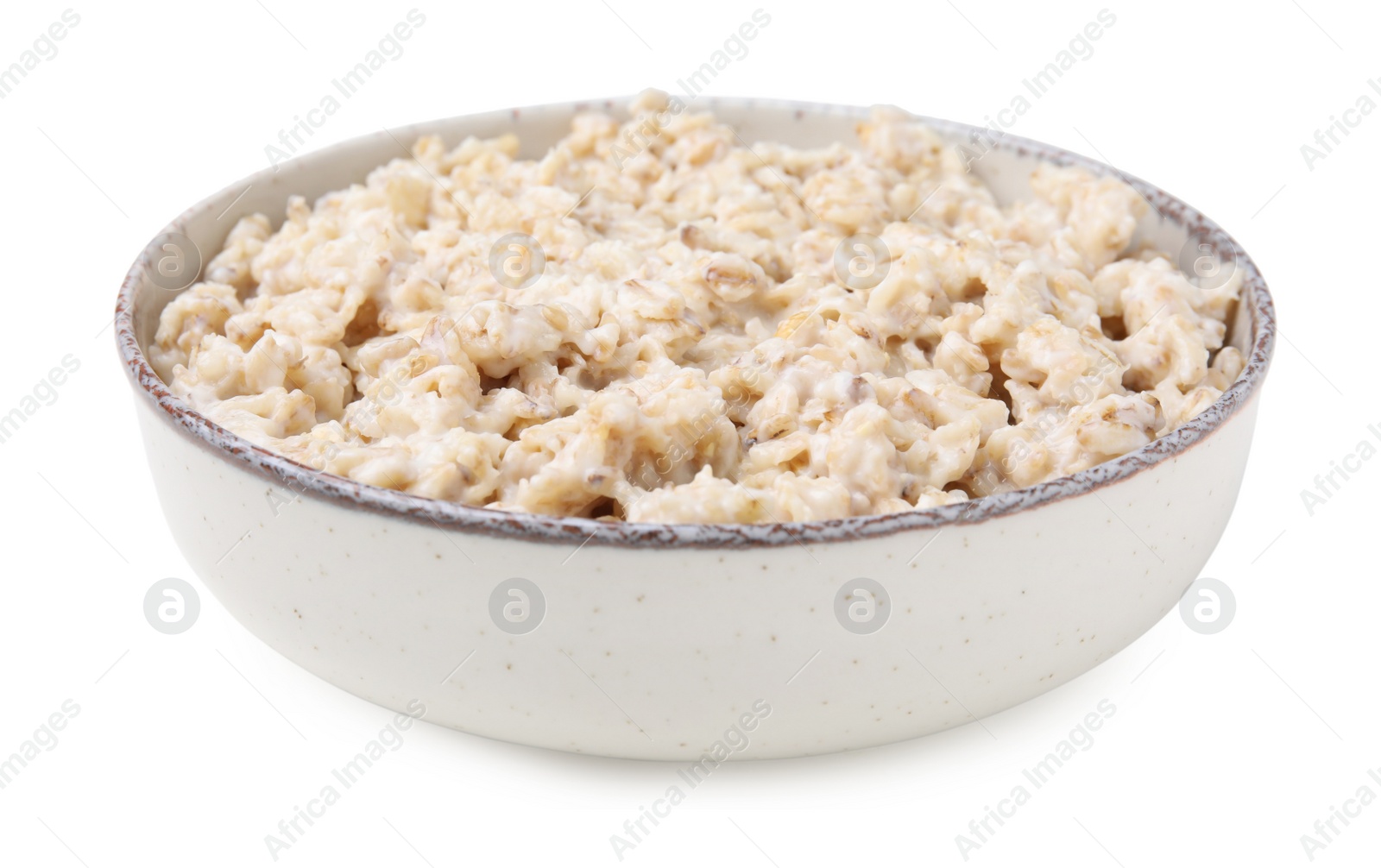 Photo of Ceramic bowl with oatmeal isolated on white