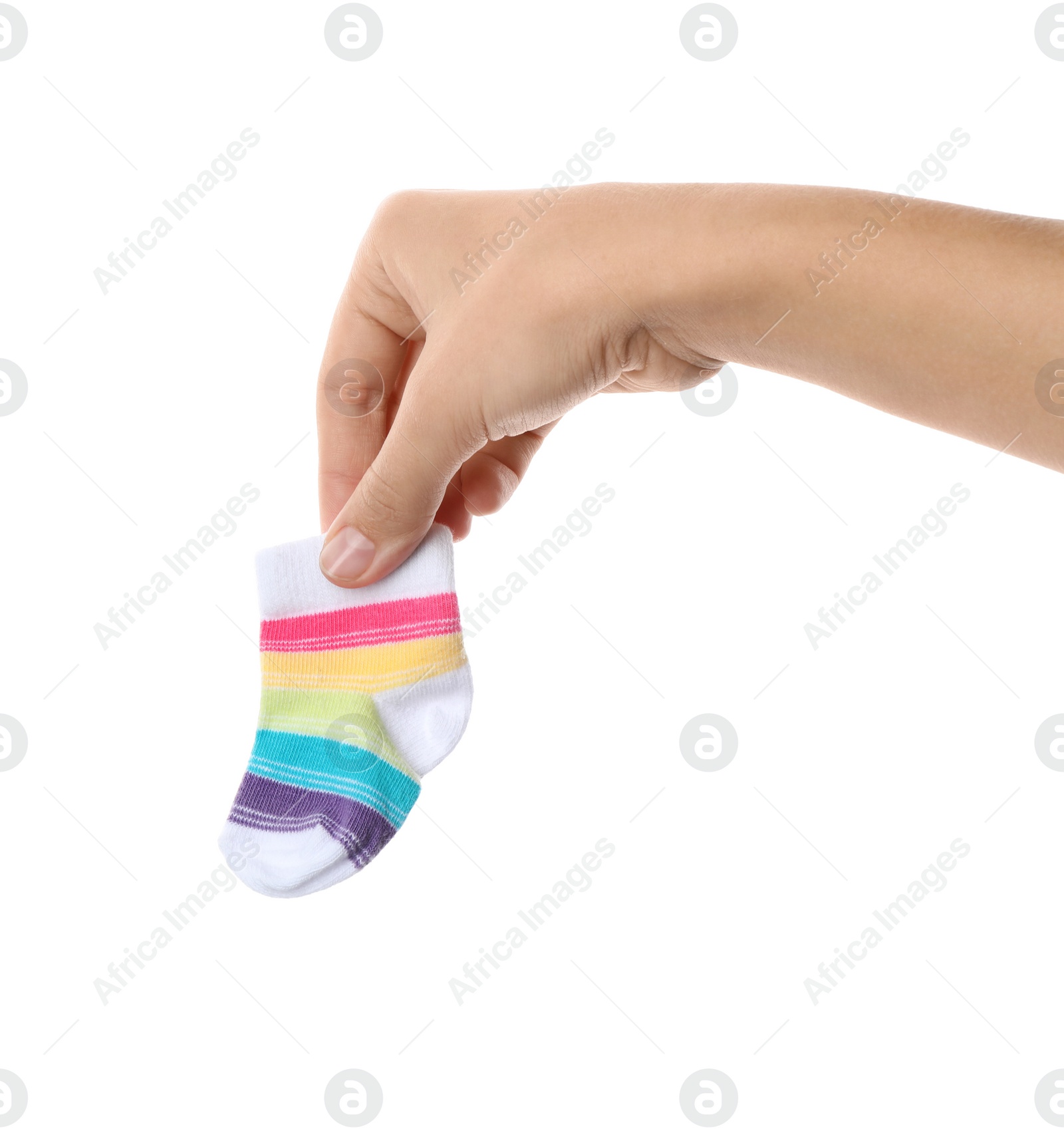 Photo of Woman holding cute child sock on white background, closeup