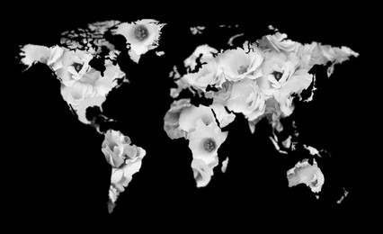 Image of World map made of beautiful flowers on black background, black and white effect. Banner design