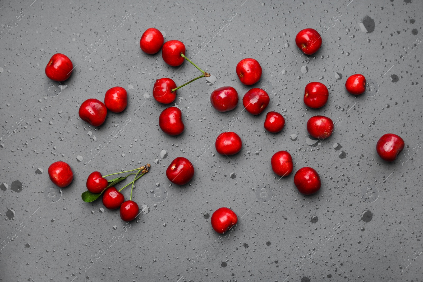 Photo of Flat lay composition with sweet red cherries on color background