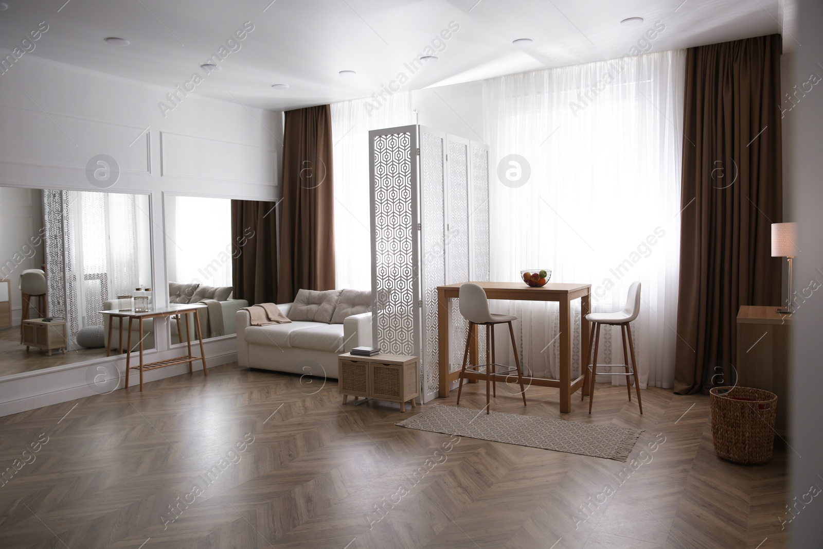 Photo of Modern living room with parquet floor and stylish furniture