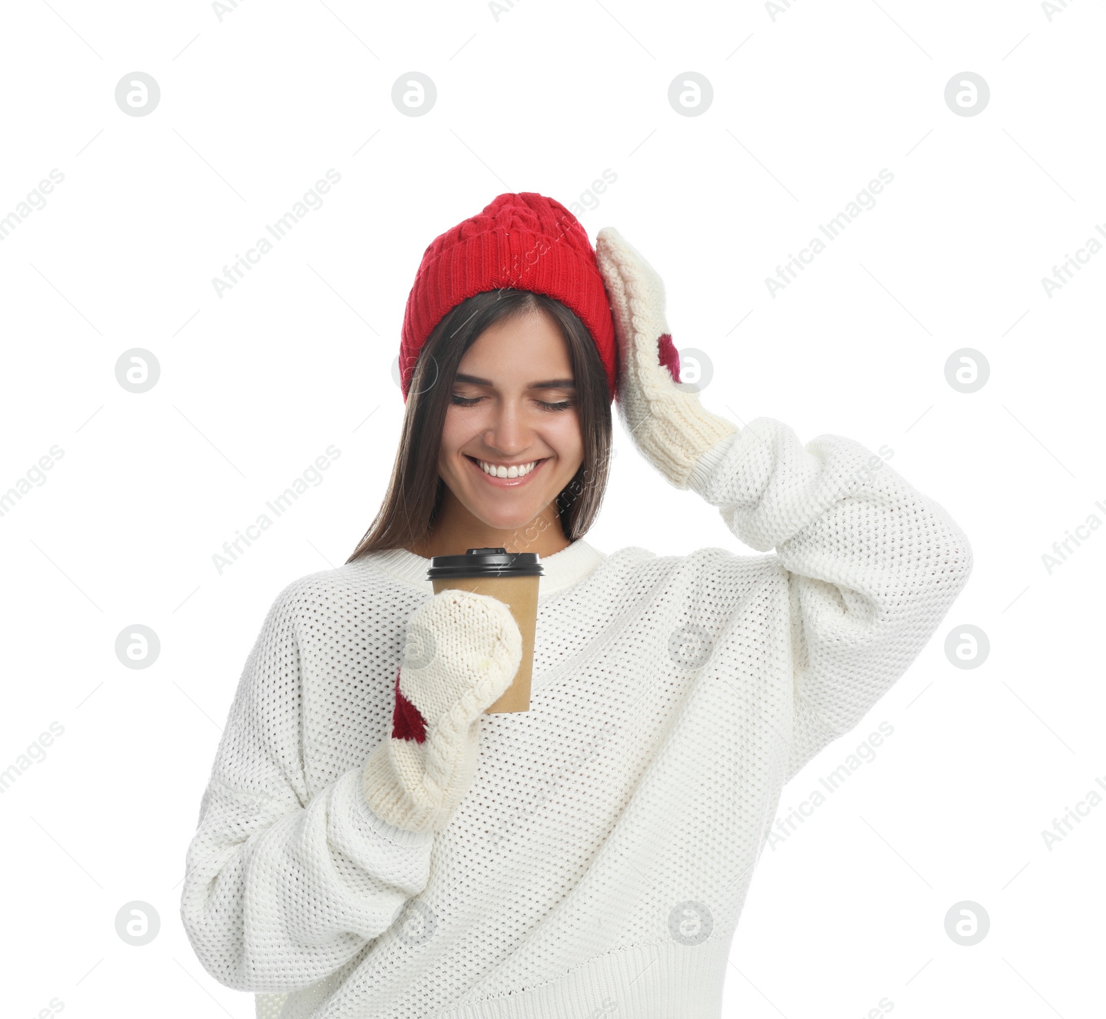 Photo of Happy beautiful woman with paper cup of mulled wine on white background