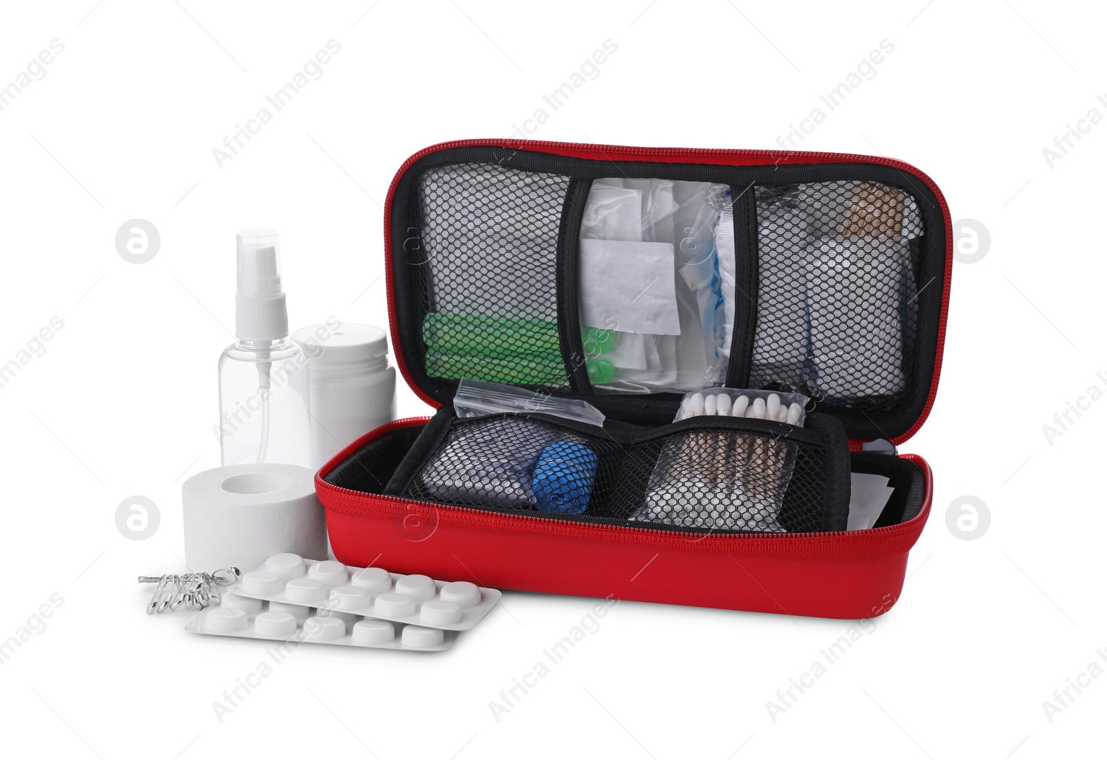 Photo of Red first aid kit with cotton buds, pins, pills, hand sanitizer and elastic bandage isolated on white