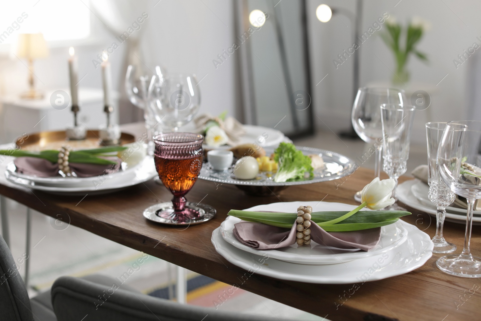 Photo of Festive Passover table setting at home. Pesach celebration