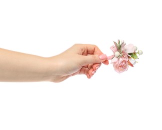 Woman holding stylish boutonniere on white background, closeup