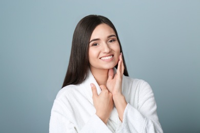 Portrait of beautiful woman on color background. Cosmetology and spa