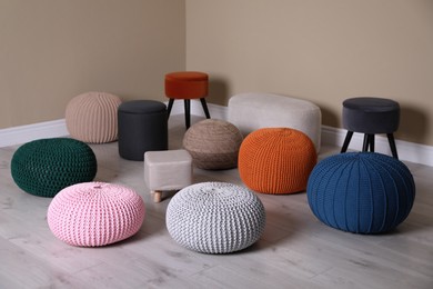 Stylish comfortable poufs in room. Home design