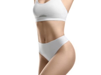 Closeup view of slim woman in underwear on white background. Cellulite problem concept
