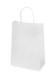 Photo of Empty shopping paper bag isolated on white