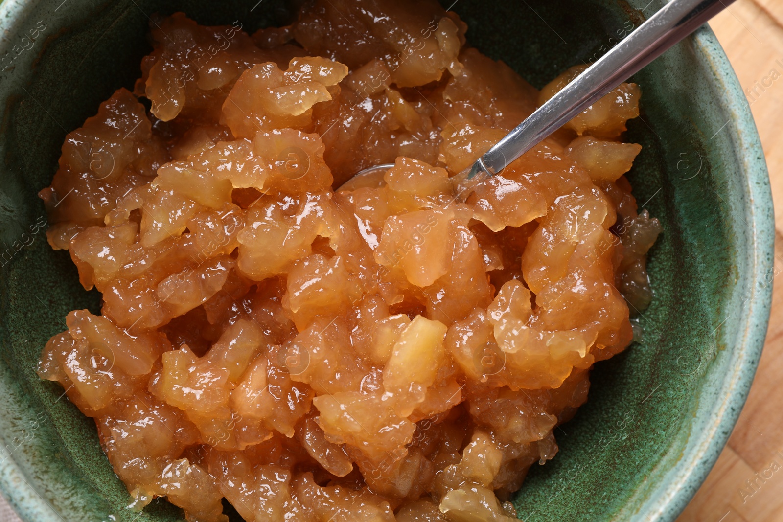Photo of Delicious apple jam in bowl, closeup view
